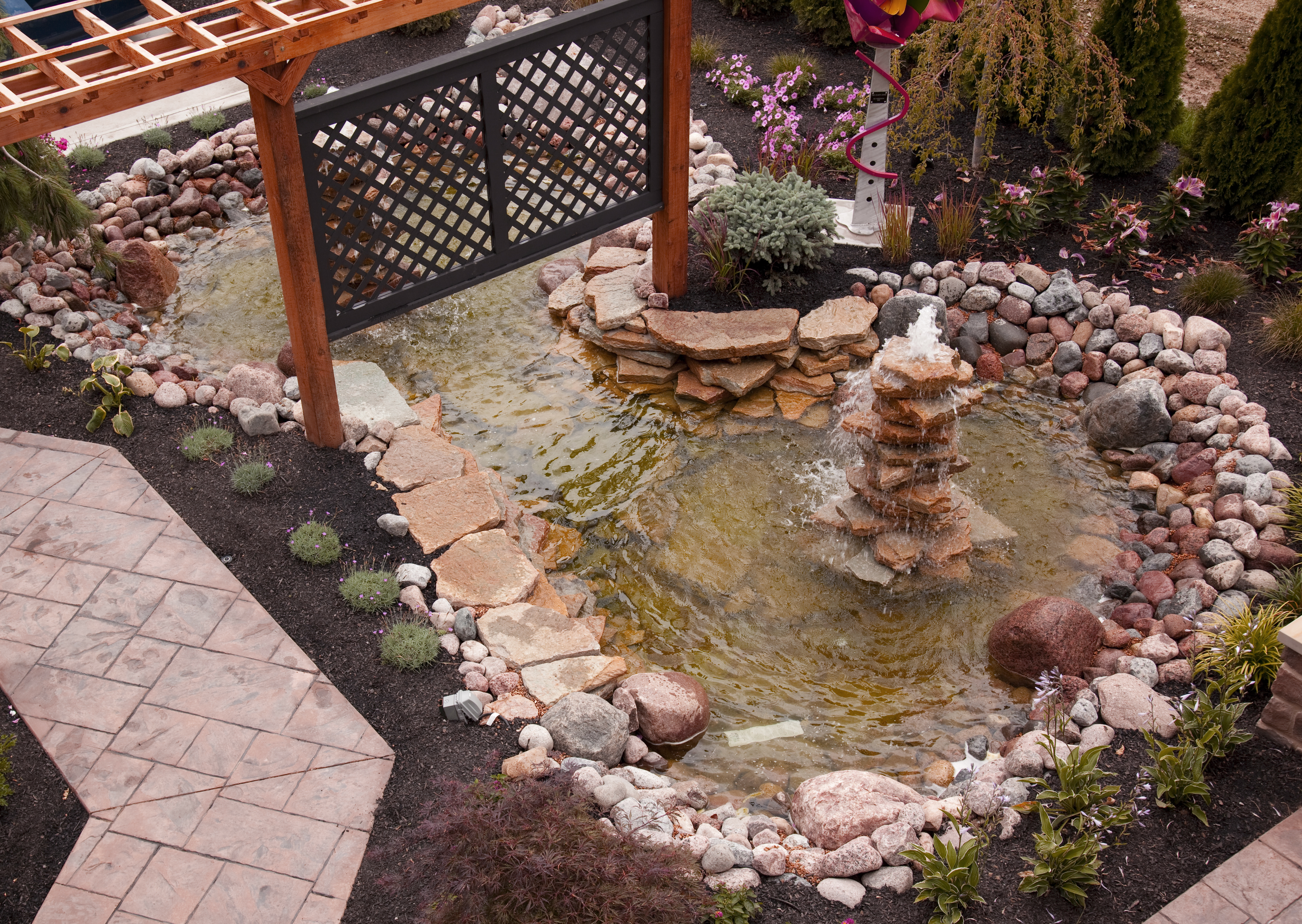 3 Stunning Ways to Incorporate Residential Fountains into Your Backyard