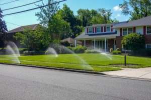 irrigation system watering front lawn